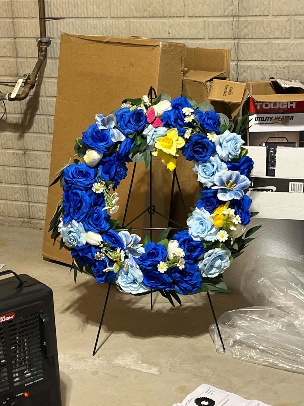 Blue and White Artificial Floral Memorial Wreath on Metal Stand